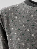 Dettaglio maglia melange con rombi verdi.png