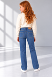 Ritratto fashion in studio con jeans Ysabel Mora.png
