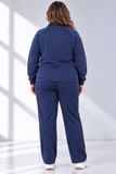Catalogo moda_ tuta blu navy vista da dietro.png