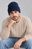 Ritratto in maglione sabbia a trecce.png